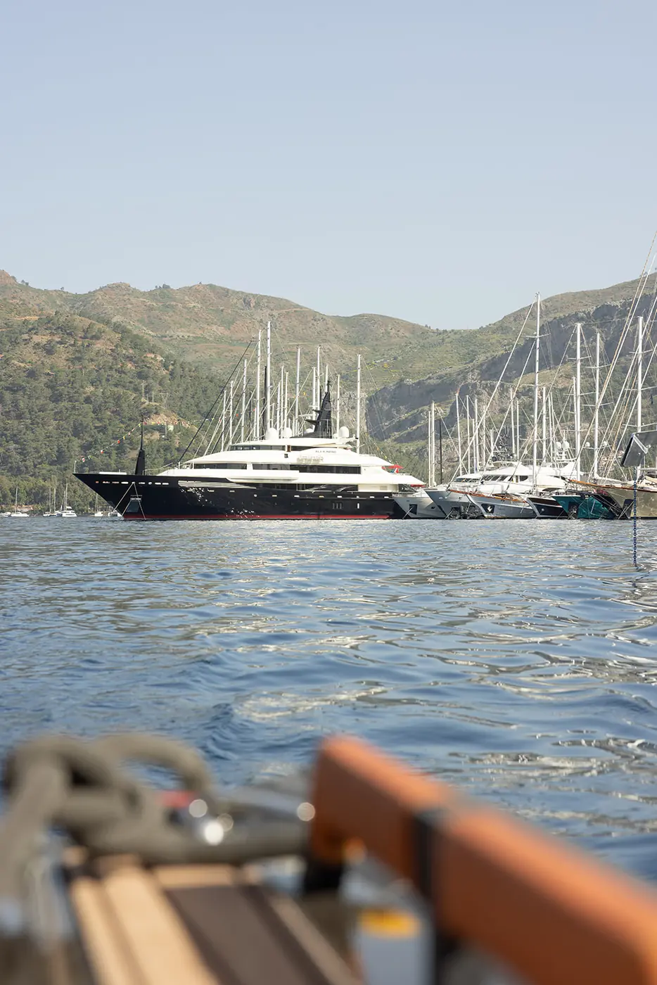 ALFA NERO at anchor seen from a tender, distance shot
