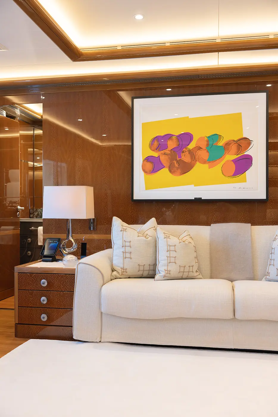 ALFA NERO master cabin sitting area with Warhol pop-art print