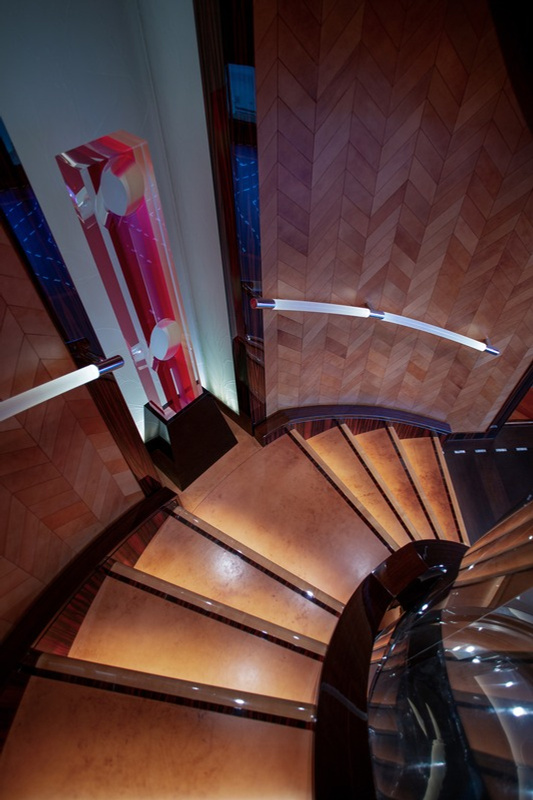 Elegant spiral staircase with Art Deco sculpture